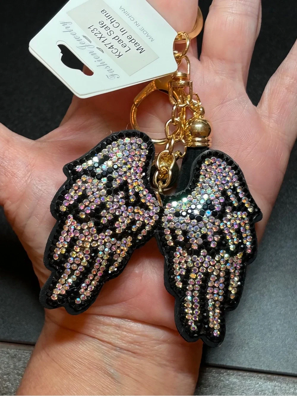 Gold-Tone Iridescent Crystal Angel Wing Keychain with Black Tassel